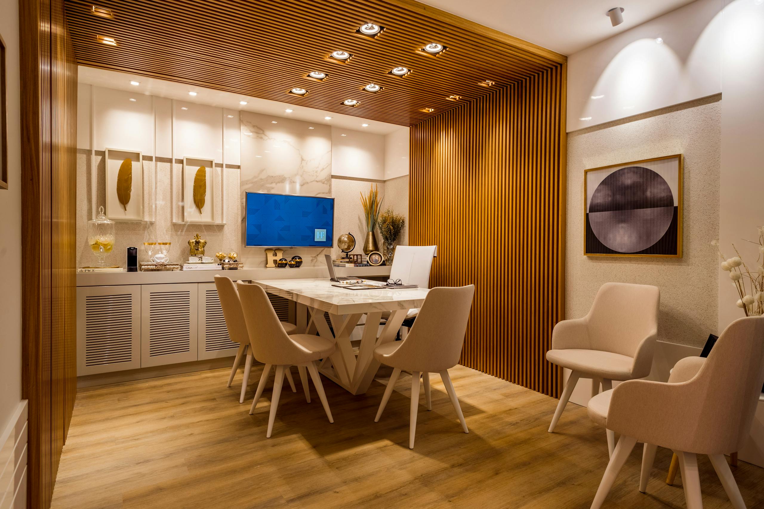 Stylish modern dining room showcasing luxurious interior design with warm wooden accents.